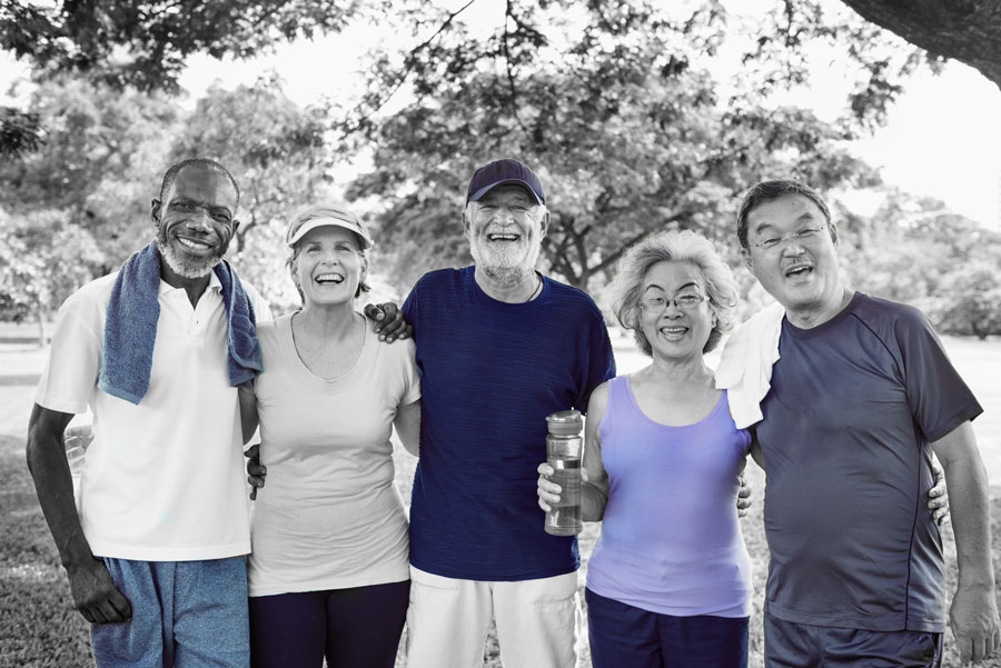 A group of active retirees enjoy a brisk workout.